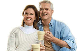 Young couple drinking coffee with smiles on their faces